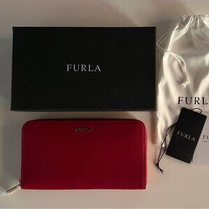 Furla extra large zip around leather wallet. Brand new with tags in box